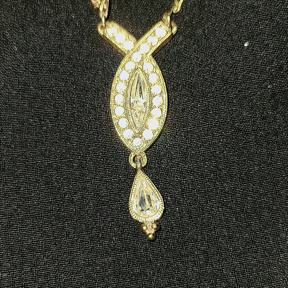 White crystal gold colored necklace